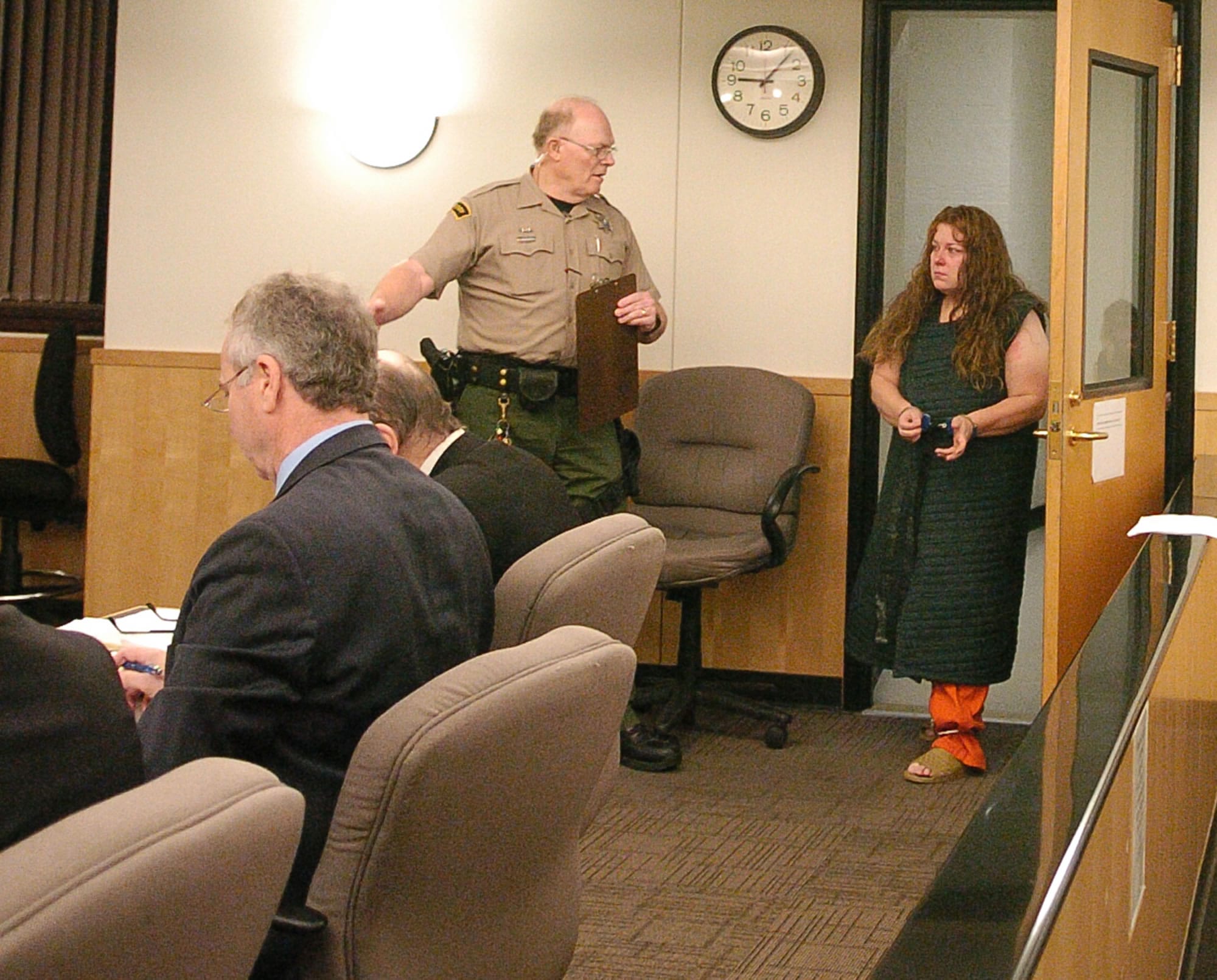 Lori Lyn Goulet, 39, enters Clark County Superior Court on Nov. 28 to appear on suspicion of solicitation to commit murder.
