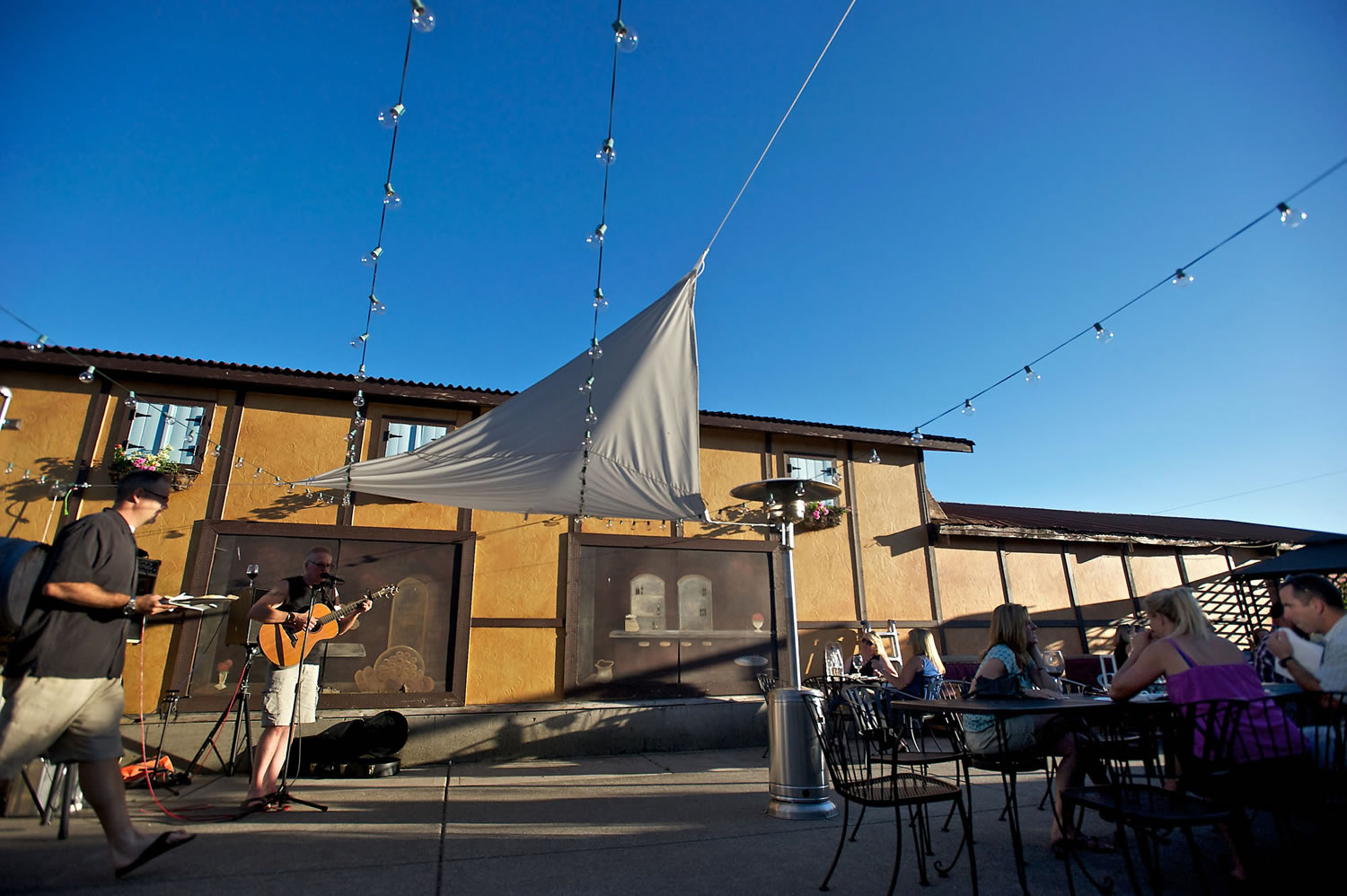 Jeff Hill, of Vancouver, plays an acoustic guitar set at Rusty Grape Vineyard in Battle Ground in June.