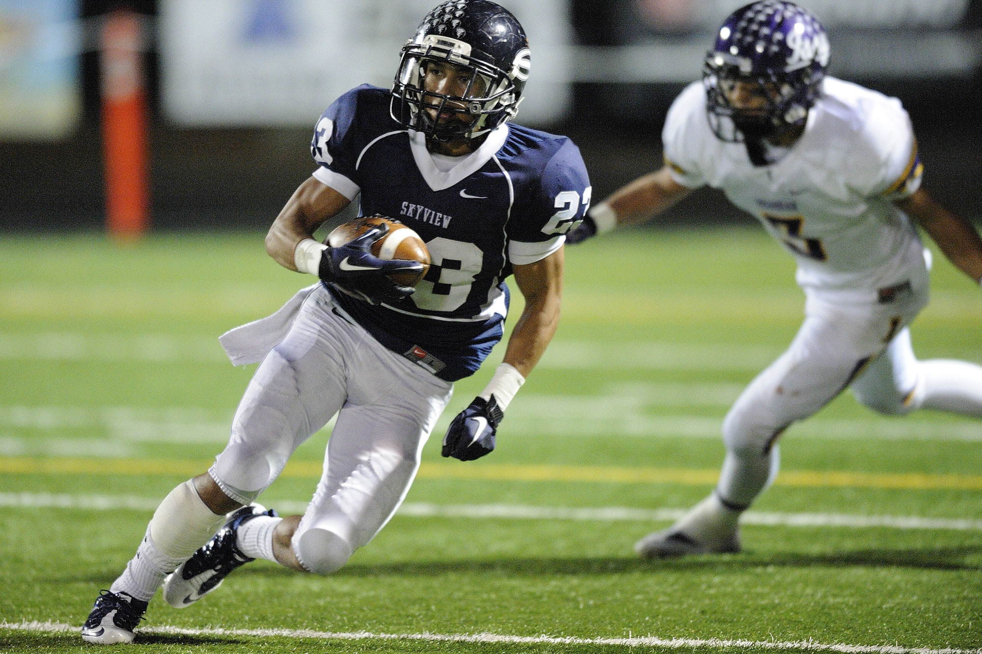 Skyview's Forrest Russell runs with the ball during a 4A playoff game last season against Issaquah