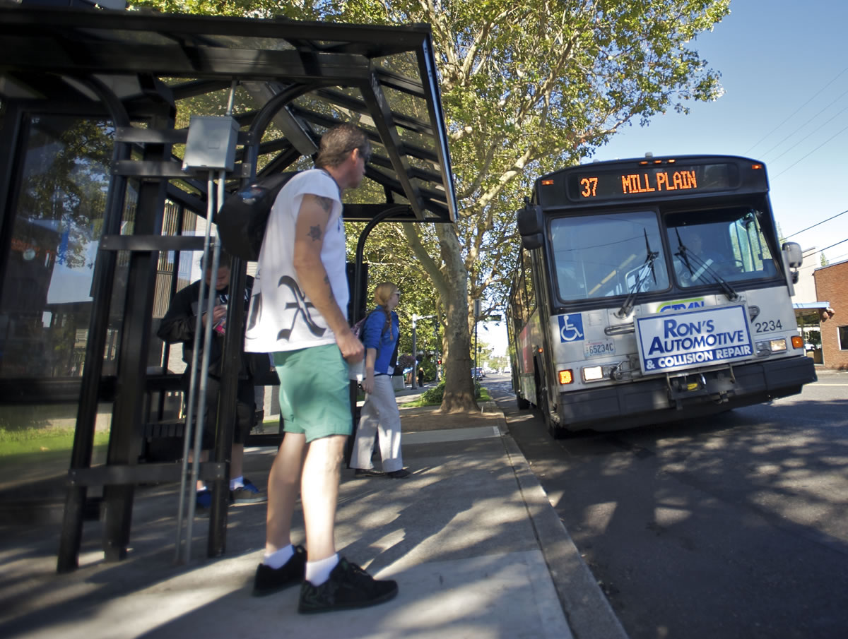 Riders prepare to board the No. 37 bus at Evergreen Boulevard and C Street in Vancouver this week. C-Tran plans to tweak several routes starting Sept. 15. Some fares will increase Sept.