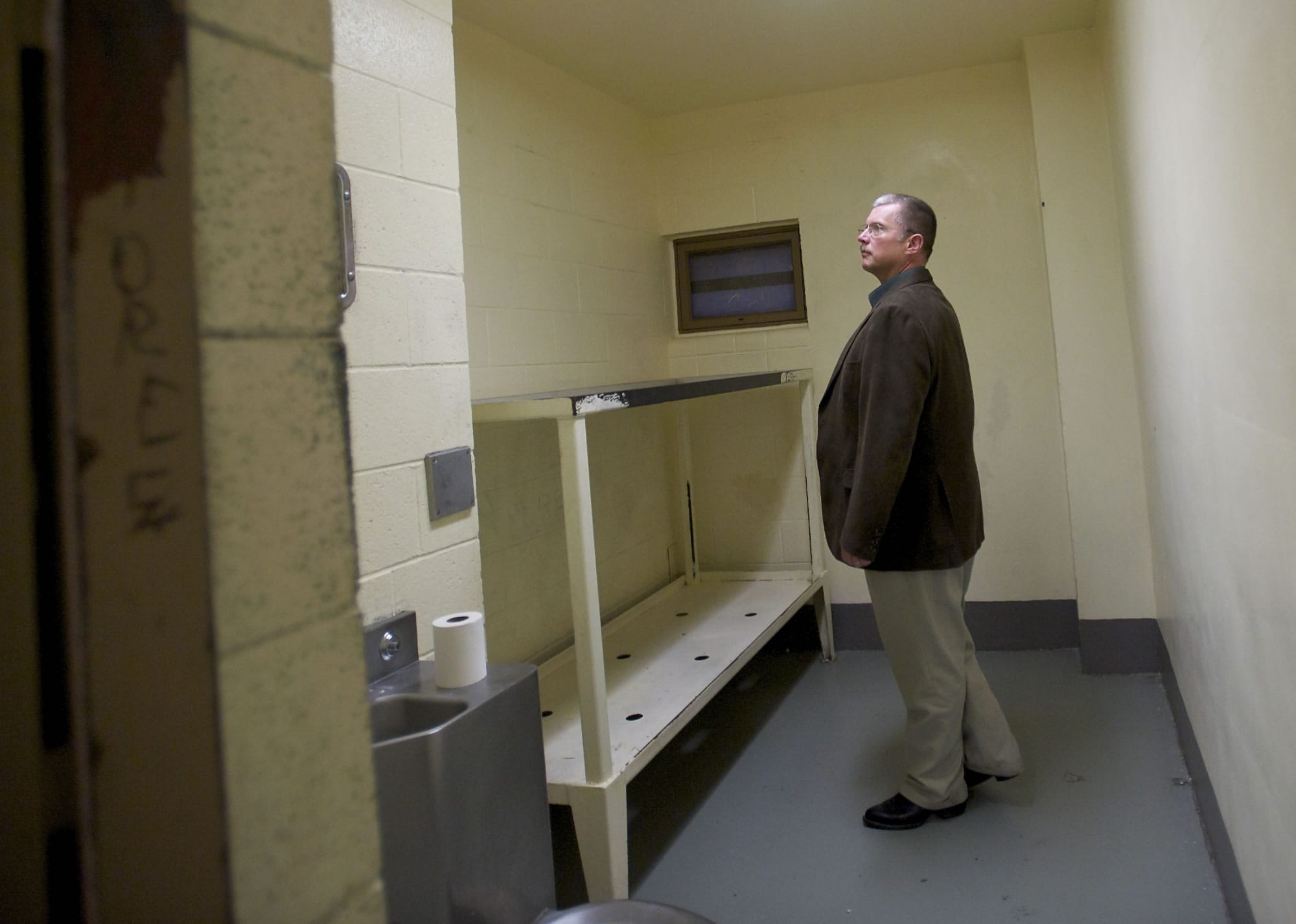 Clark County Sheriff's Commander Ric Bishop gives a tour of an empty cell inside A Pod, the housing unit for inmates on suicide watch.