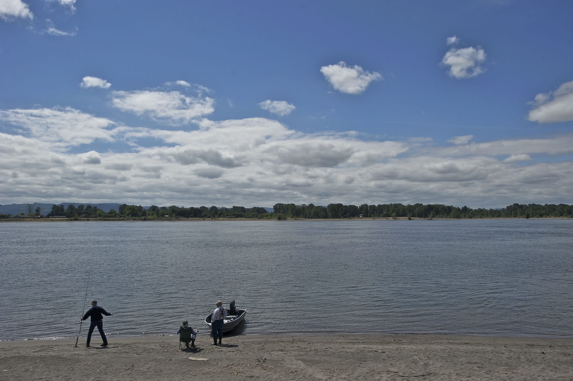 Sand Tampers Club members, from left, Guy Miller, 54, of Felida, Art McGrew, 73, of Vancouver, and Wally Schriener, 76, of Battle Ground, fish the Tena Bar on The Columbia River on Friday.