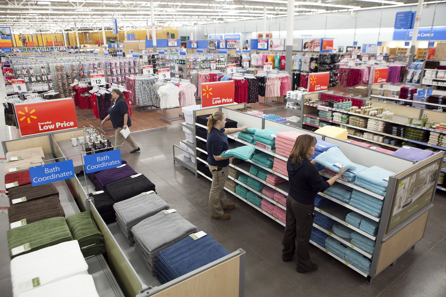 Employees stock towels in the Woodland Walmart days before its January 2011 opening.