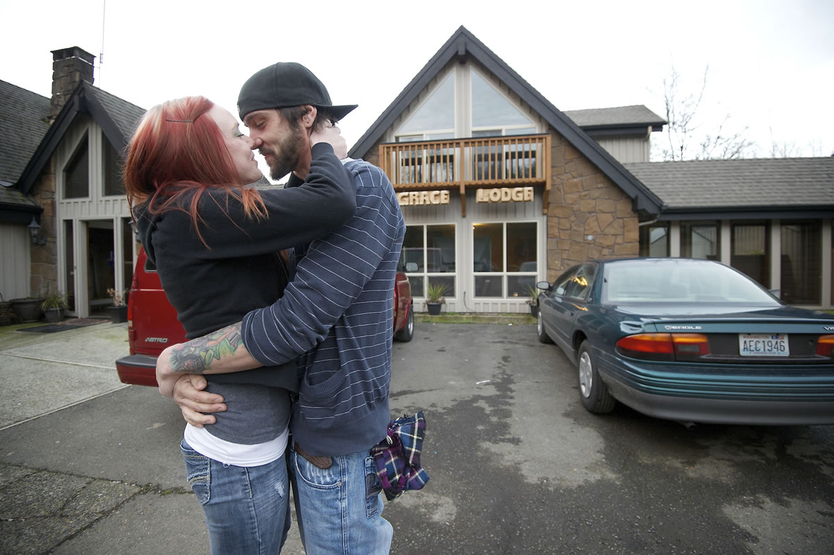 Travis Trenda and Mandy Cooper embrace as they reunite outside Grace Lodge, a home for recovering drug addicts. The couple spent a few hours together, eating dinner and with Mandy giving Travis a haircut.
