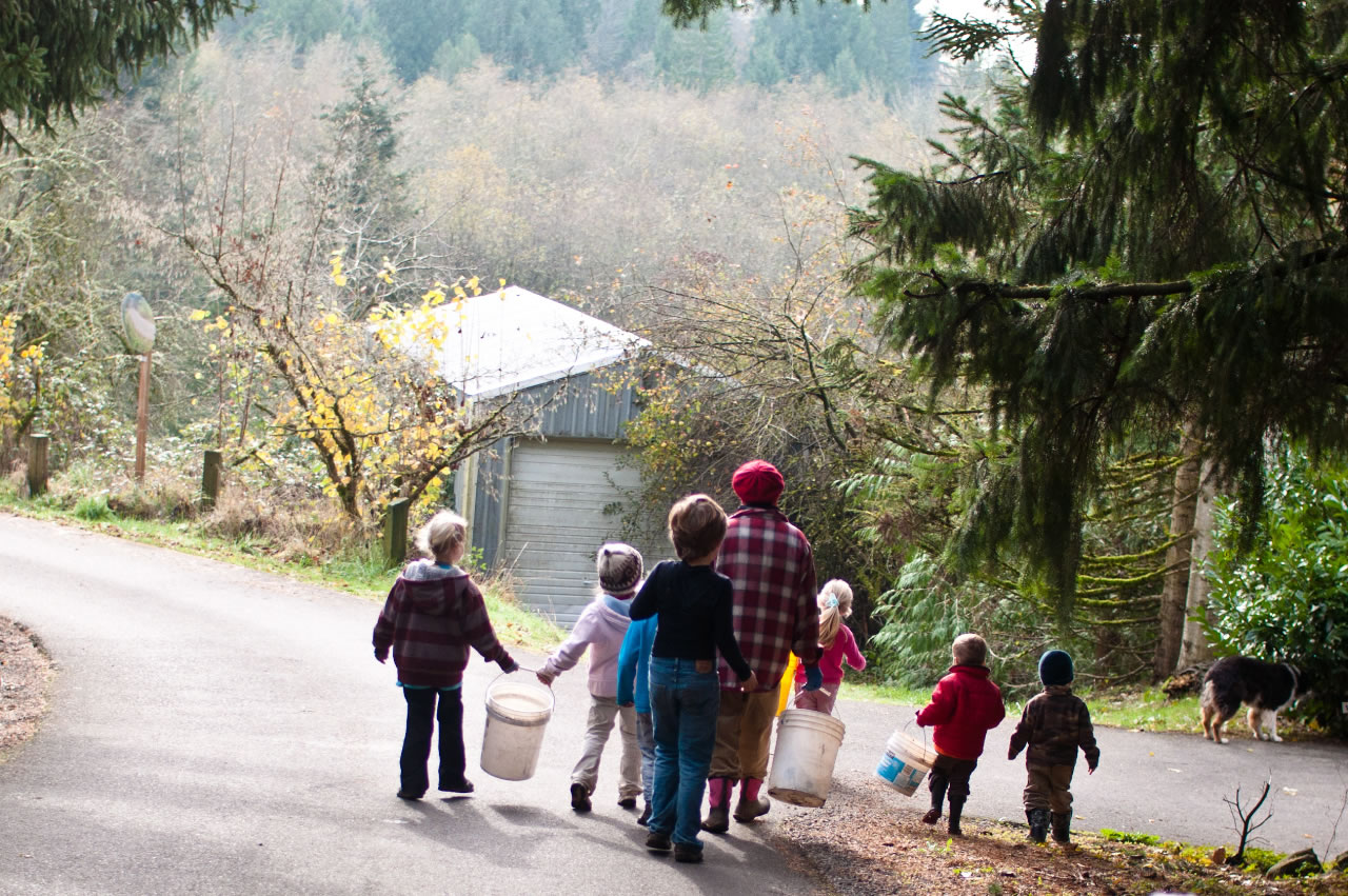 Mattie Roscoe and her grandchildren are pictured in the Roscoe family calendar as they take an early morning walk to pick apples near their home in Hockinson.