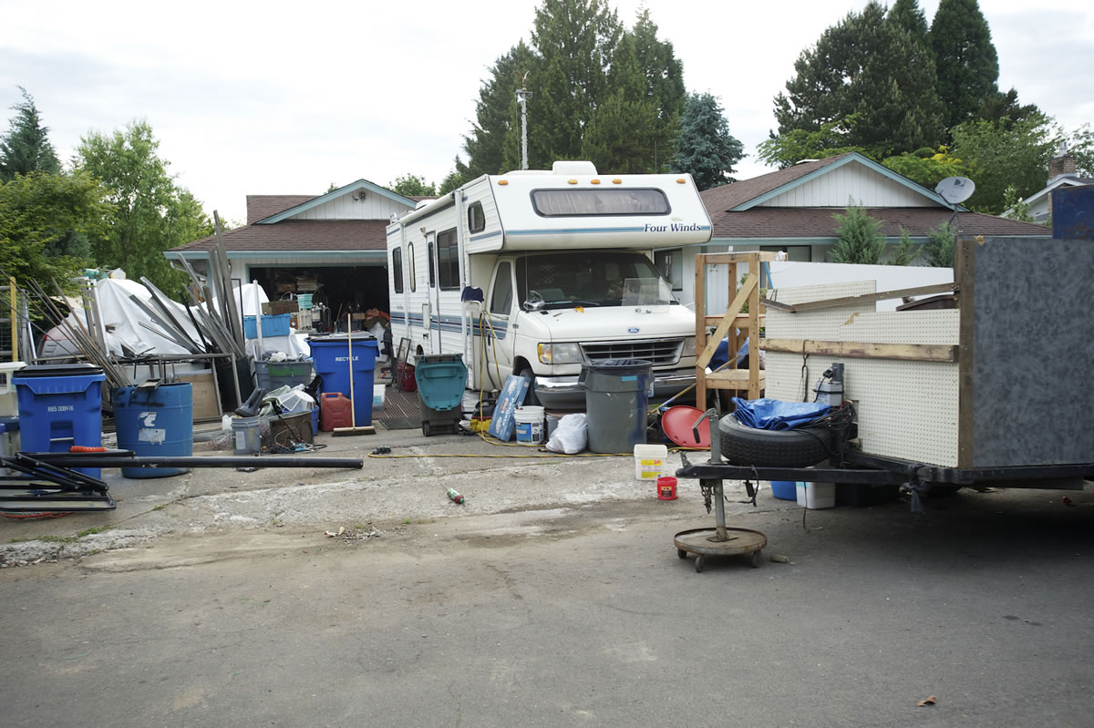 Debris from a salvage business has littered a property on Northeast 10th Avenue for almost two years.
