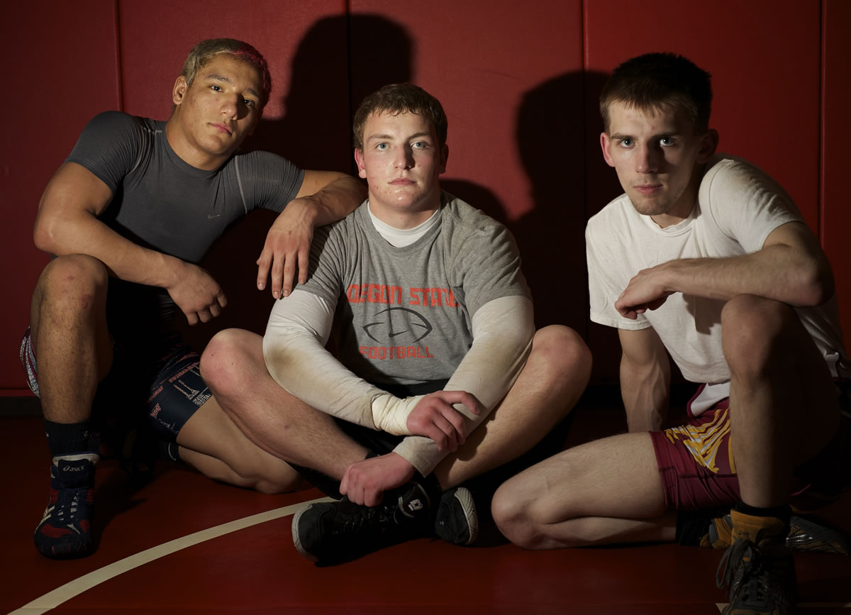 Prairie wrestlers (from left) Mario Gonzalez, Tyler Duncan and Wil Treadwell each have their unique story about how they reached state.