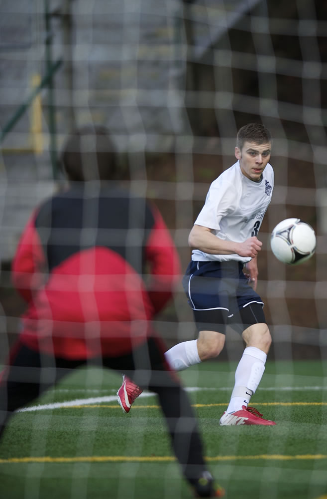 Skyview's Austin Horner puts a shot on goal against Mountain View in the first half at Kiggins Bowl on Wednesday March 20, 2013.