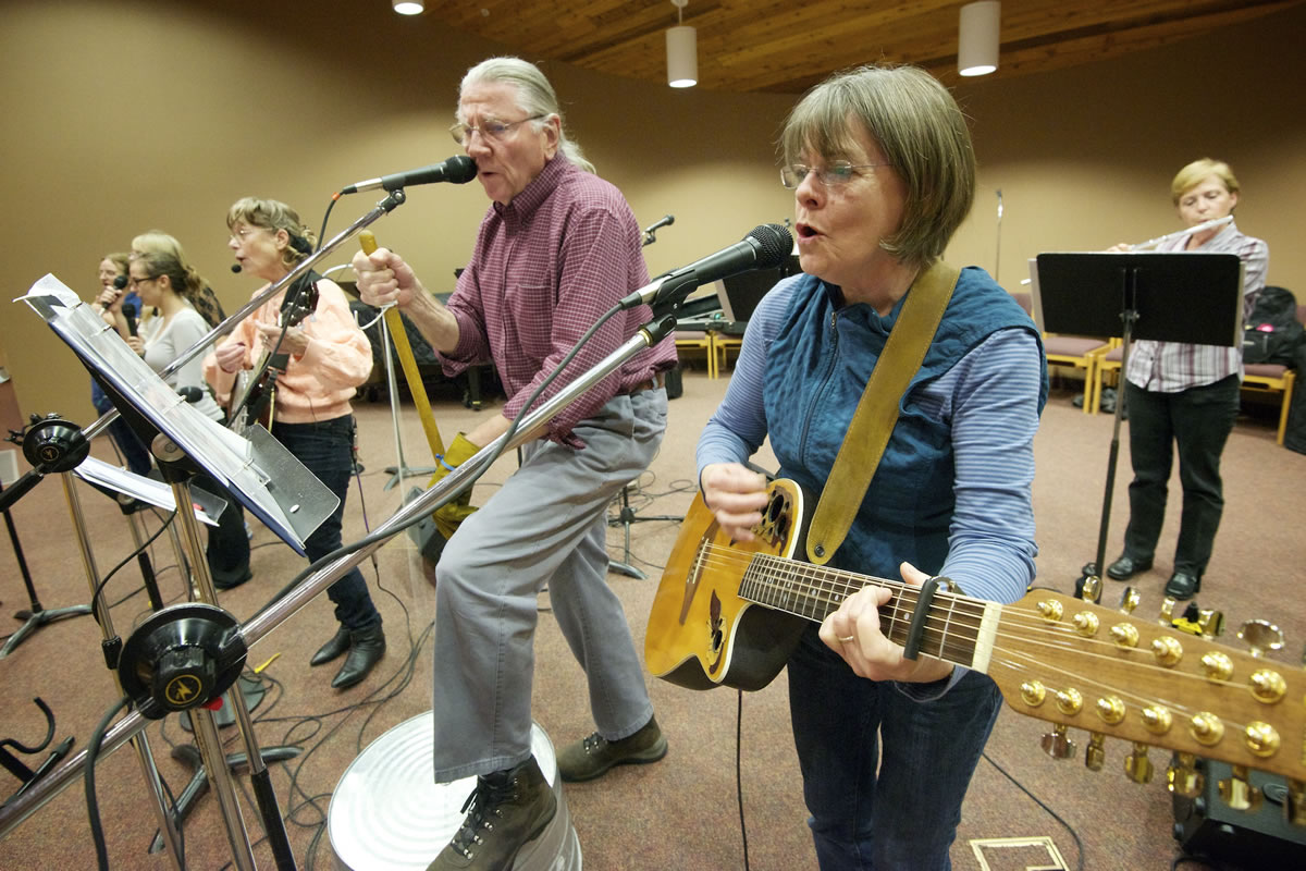 Terri Clark, right, and Bobby Clark perform spiritual songs during a rehearsal last week at St.