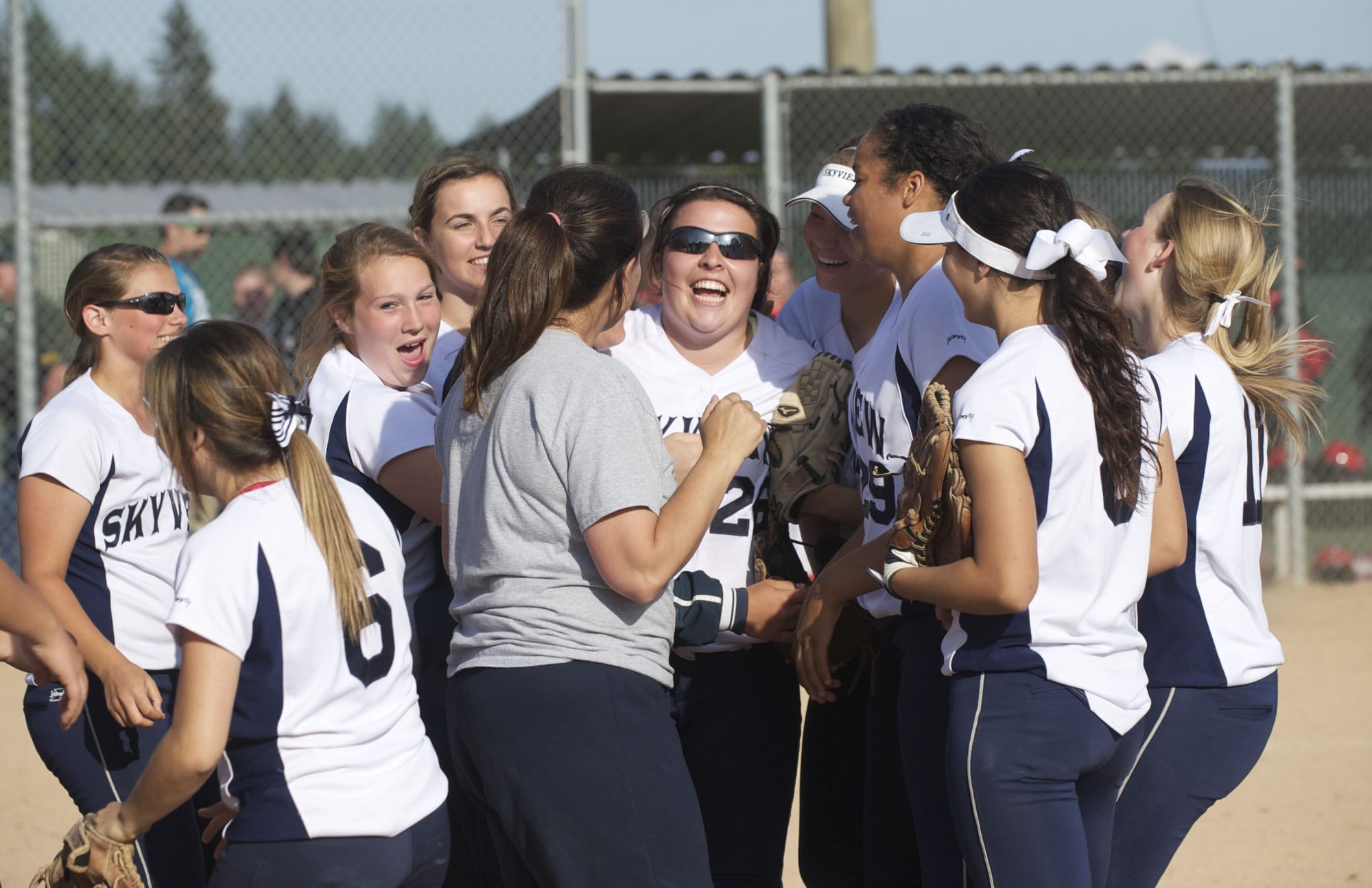 Skyview celebrates after beating Camas to win the 4A District Softball Championship, Tuesday, May 14, 2013.
