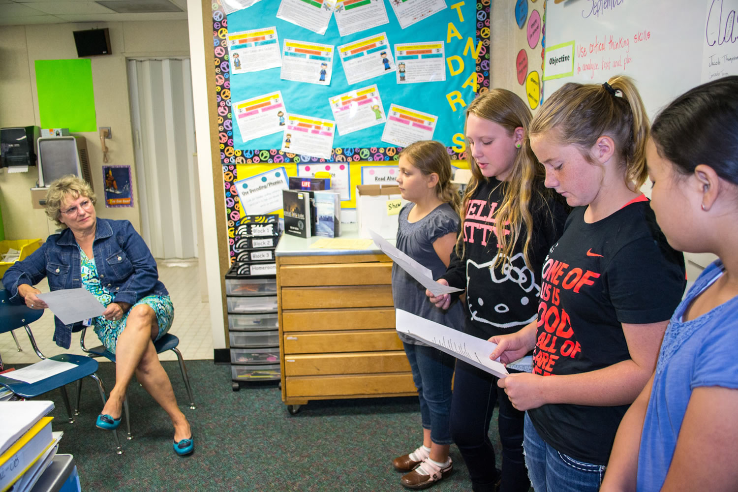 Ridgefield: Sixth-graders at South Ridge Elementary School read a contract to Principal Janice Sauve that their class signed at the start of the school year promising to hold themselves responsible for their behavior.
