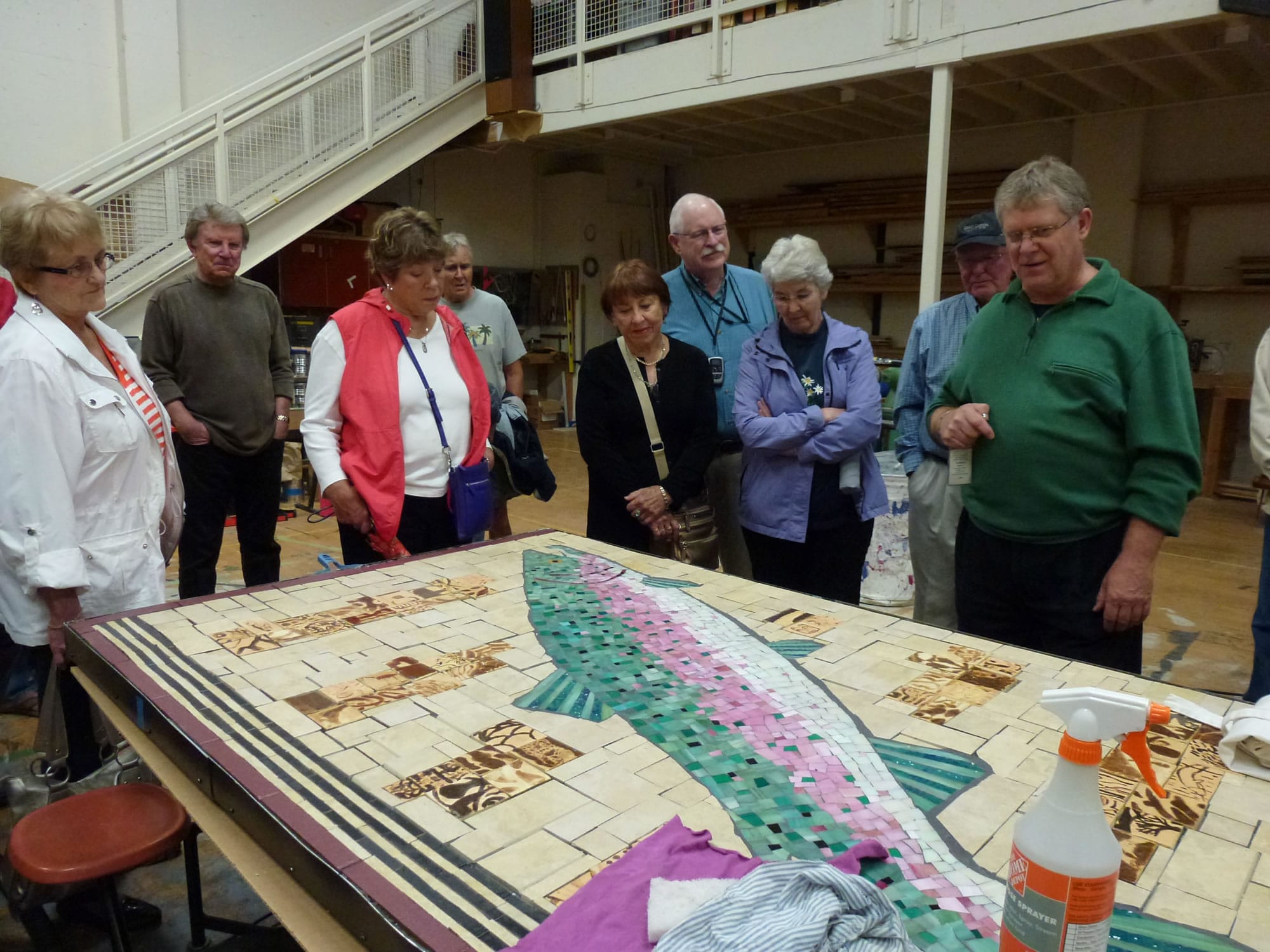 Shumway: Graduates of the Fort Vancouver High School class of '58 admire a mosaic headed for the window panels of the Vancouver School of Arts and Academics.