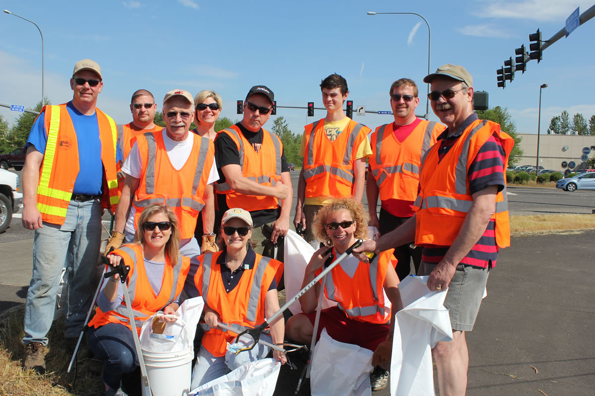 Battle Ground: Local Rotarians spent May 11 cleaning up litter from state Highway 503.