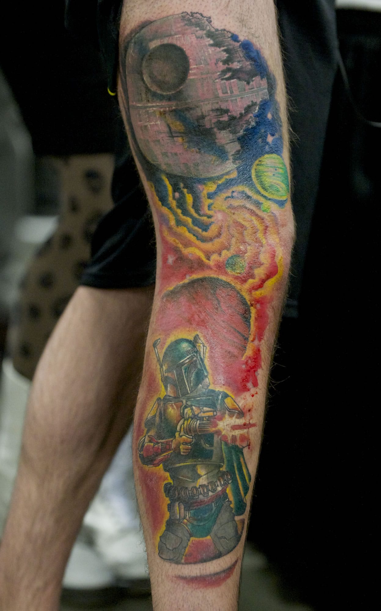 Vancouver's Evan Bastian, 25, shows the Star Wars tattoo that was judged the best of the day on Saturday.