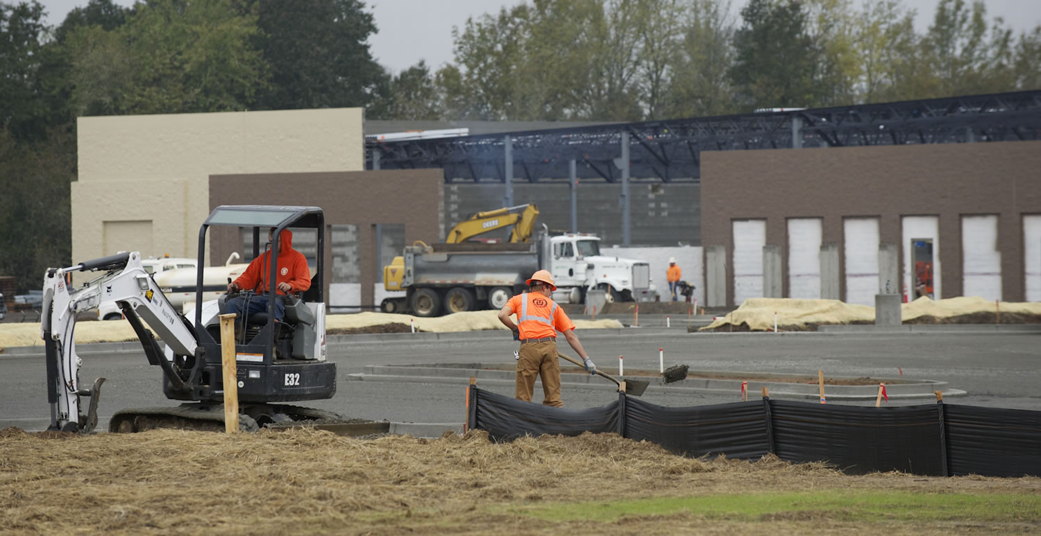 Construction of a Battle Ground Walmart store heads toward a 2014 completion by subcontractor crews working under Boise, Idaho-based general contractor McAlvain Group of Companies Inc.
