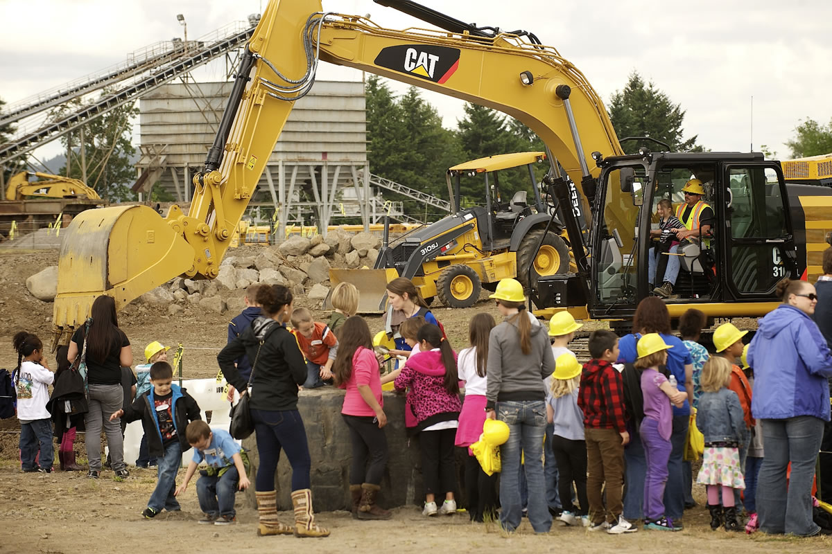 Students from Mill Plain Elementary, including the kindergarten students from Crestline Elementary, converged at the Cemex/Fisher Quarry for hands-on heavy equipment fun at the sneak preview of Dozer Day on Friday.