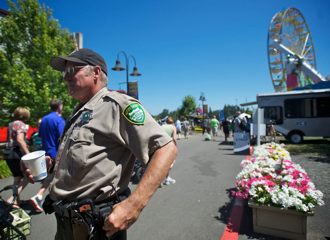 A Clark County Sheriff's deputy patrols the Clark County Fair on Friday. The sheriff's office provides deputies to work at the event on their days off.