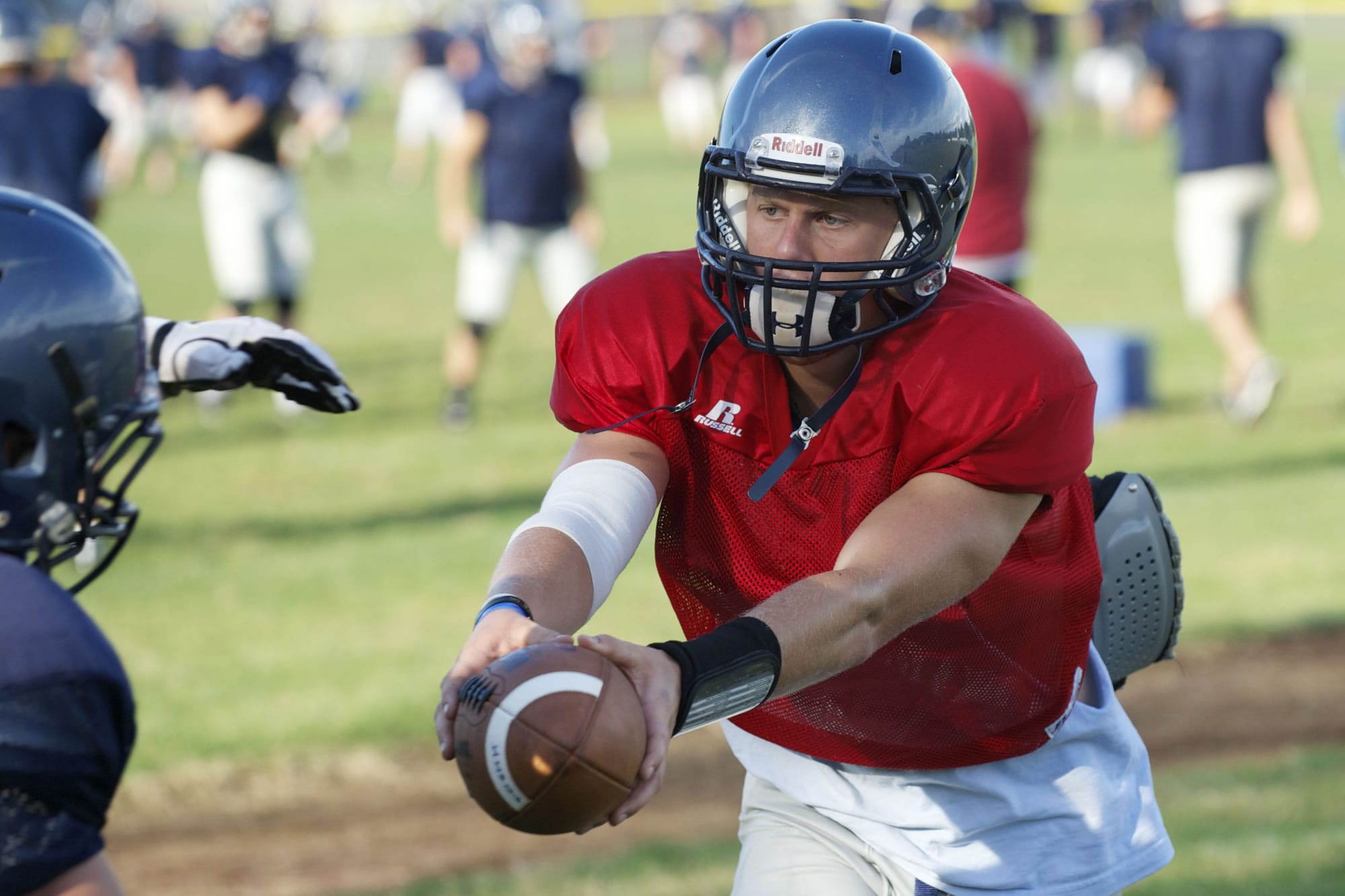 Hockinson High School senior quarterback Jess Krahn takes part in practice.