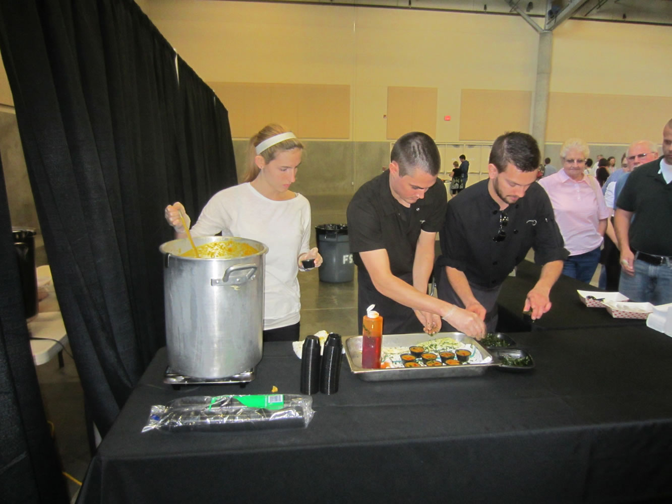 Ridgefield/Fairgrounds: Mark Wornson of Tommy O's restaurant, right, prepares samples of his award-winning roasted chicken and butternut squash soup at the 12th annual Share-A-Bowl fundraiser.