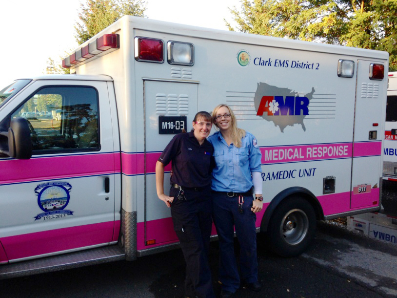 Northcrest: American Medical Response of Southwest Washington paramedics Julie Bolt, left, and Faith Winslow stand by one of two ambulances that were decorated with pink stripes in support of National Breast Cancer Awareness Month in October.
