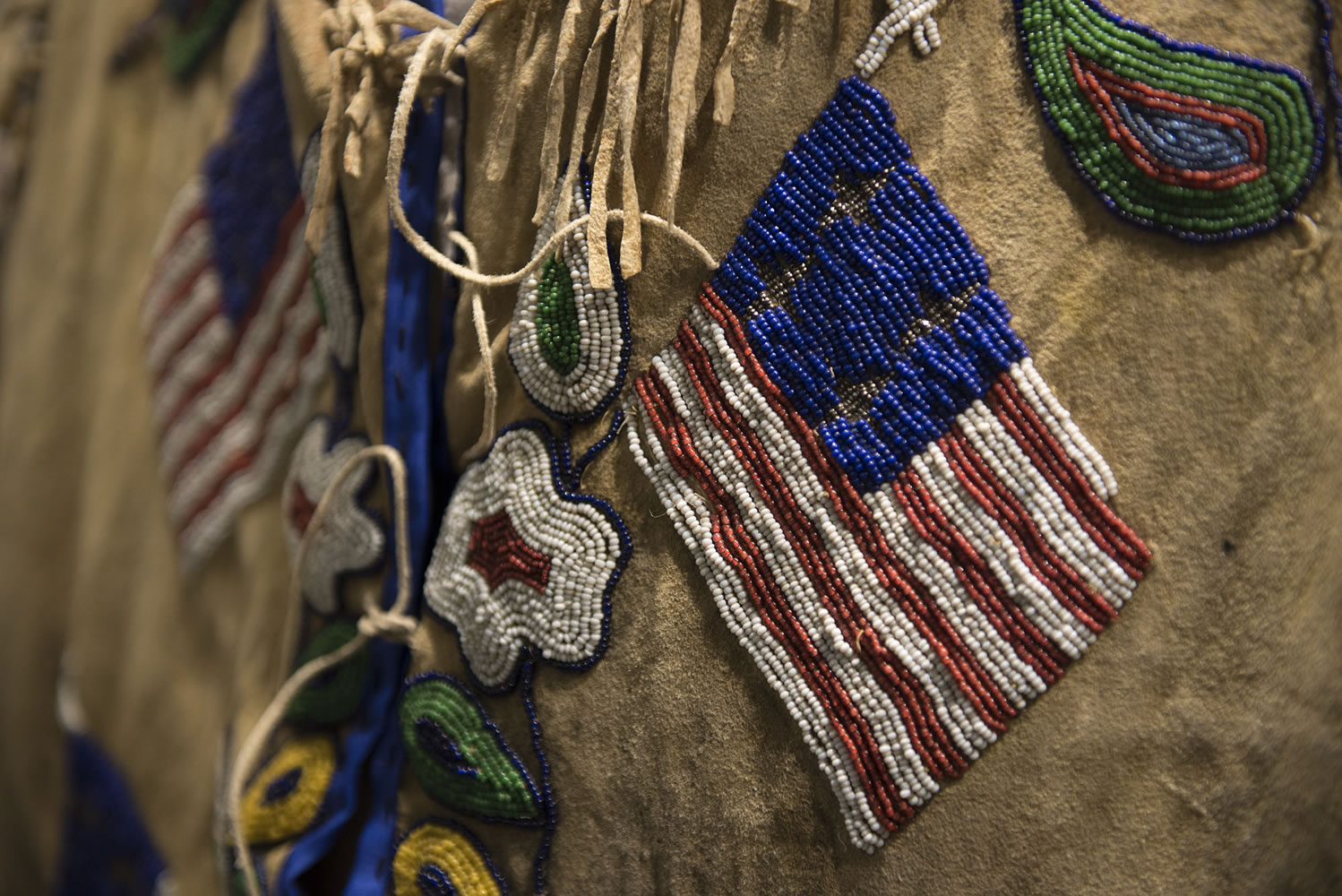 Patriotic themes -- including American flags on a man&#039;s jacket -- became popular in the early 1900s.