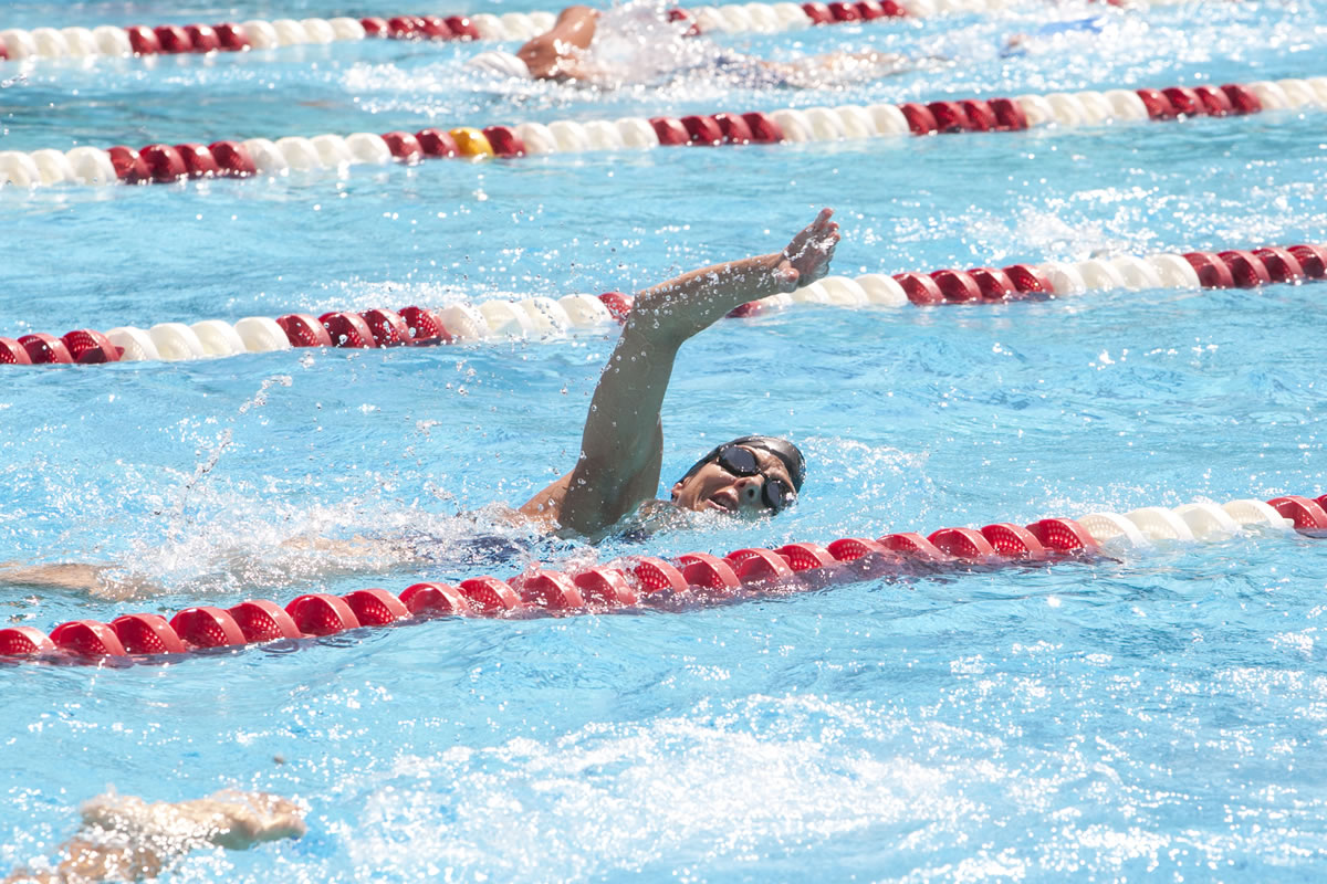 Arlene Delmage practices with her swim team, the Oregon Reign Masters, at Mt. Hood Community College in Gresham, Ore.