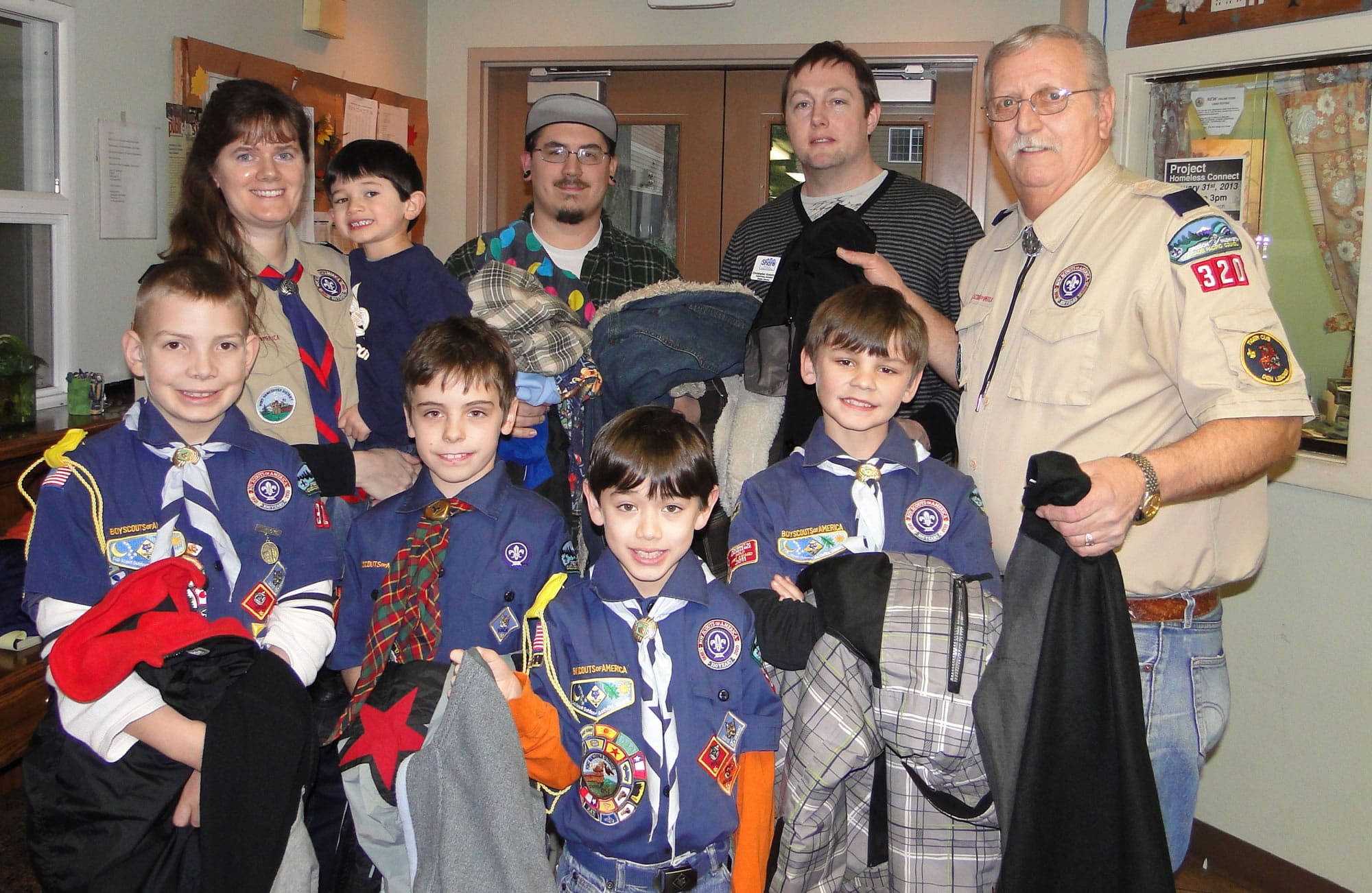 Bagley Downs: Members of Cub Scout Pack 320 drop off donated coats, which were collected Jan.