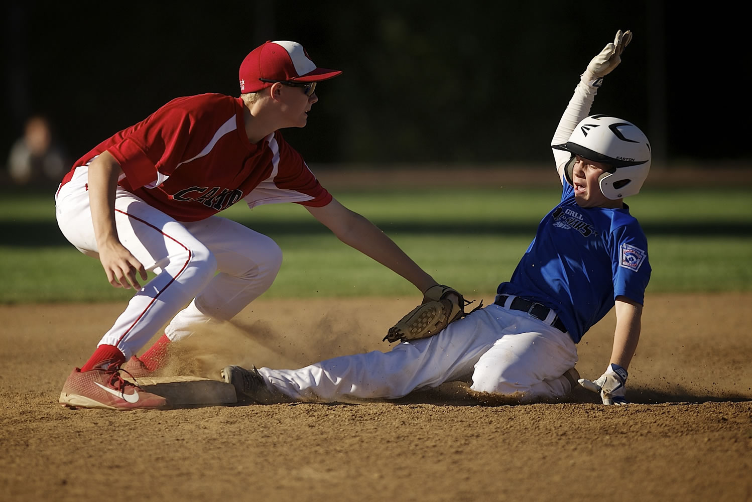 Second baseman Shane Jamison of Camas tags out Mitchell Powers of Greater Richland Little League at second base during the Washington State Little League All-Star tournament at Luke Jensen Sports Park in Vancouver.