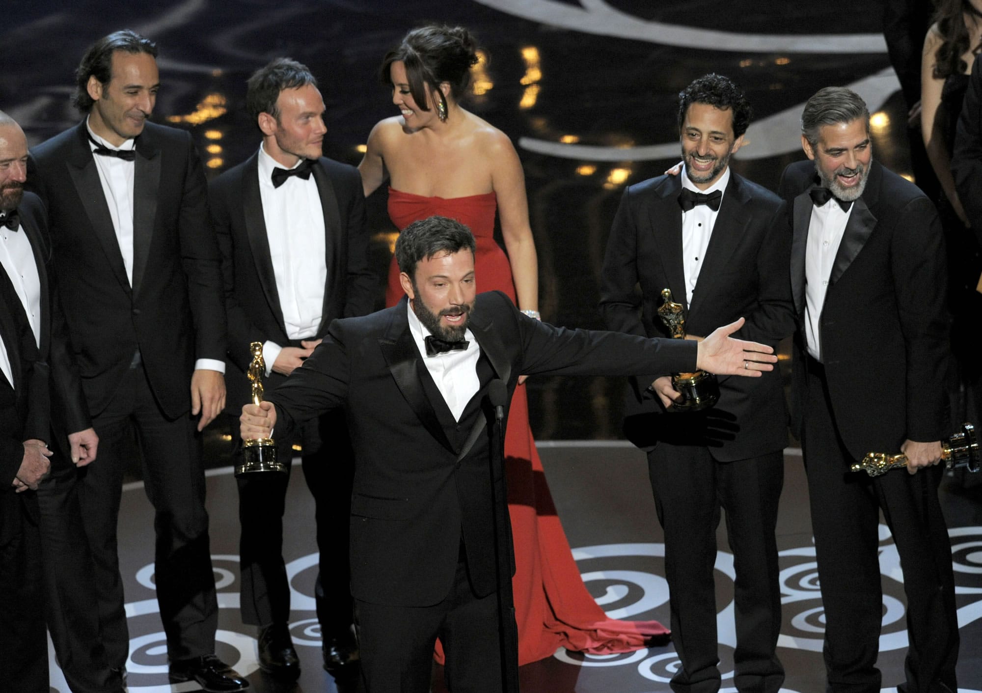 Director/producer Ben Affleck accepts the award for best picture for &quot;Argo&quot; during the Oscars at the Dolby Theatre on Sunday in Los Angeles.