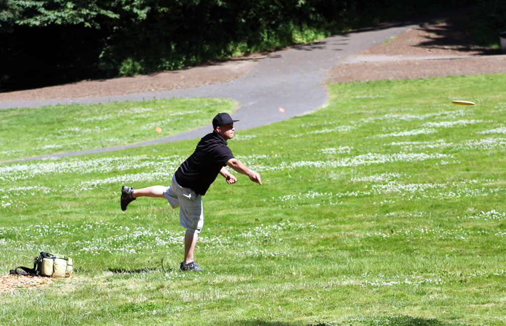West Minnehaha: Disc golfer Eddie Florance lets fly at Leverich Park disc golf tournament on July 7 and 8.