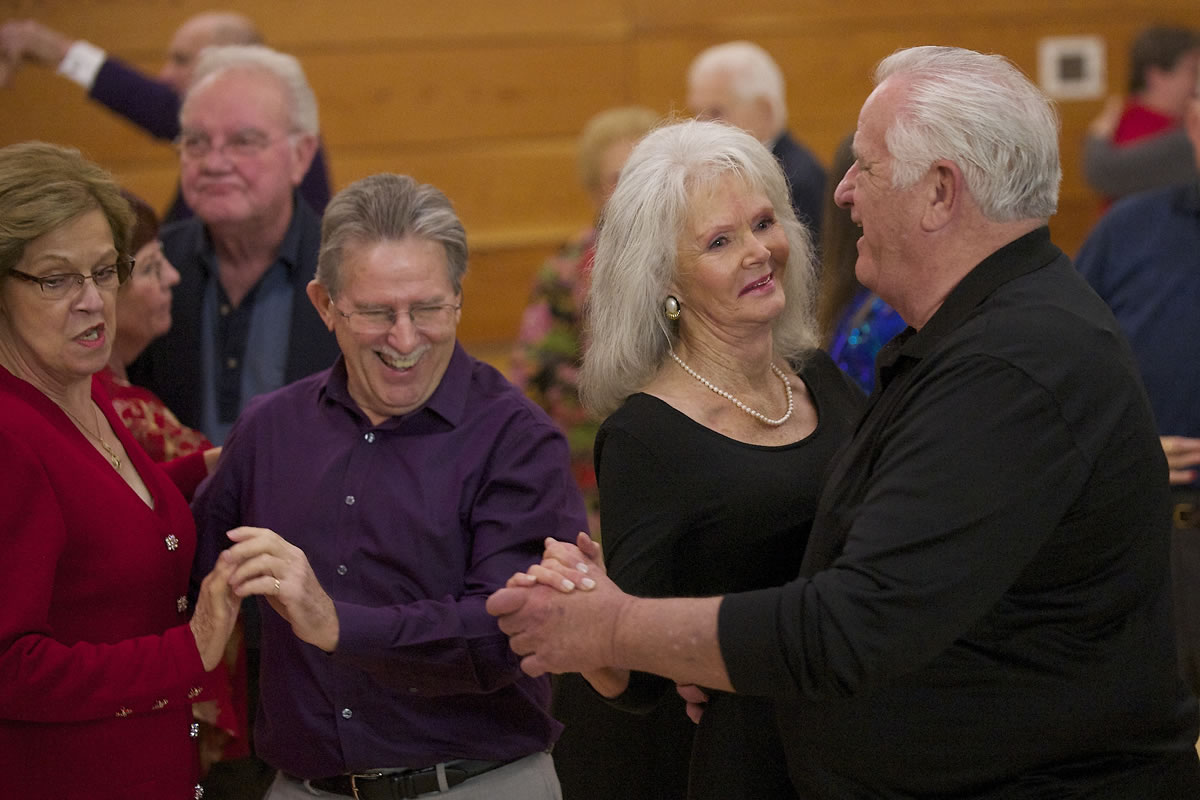 Riny Vandaal (right), Clark Helvey, Cynthia Copple and Norm Reiber dance the night away at 2013&#039;s Swinging in the New Year dance at the Luepke Senior Center.