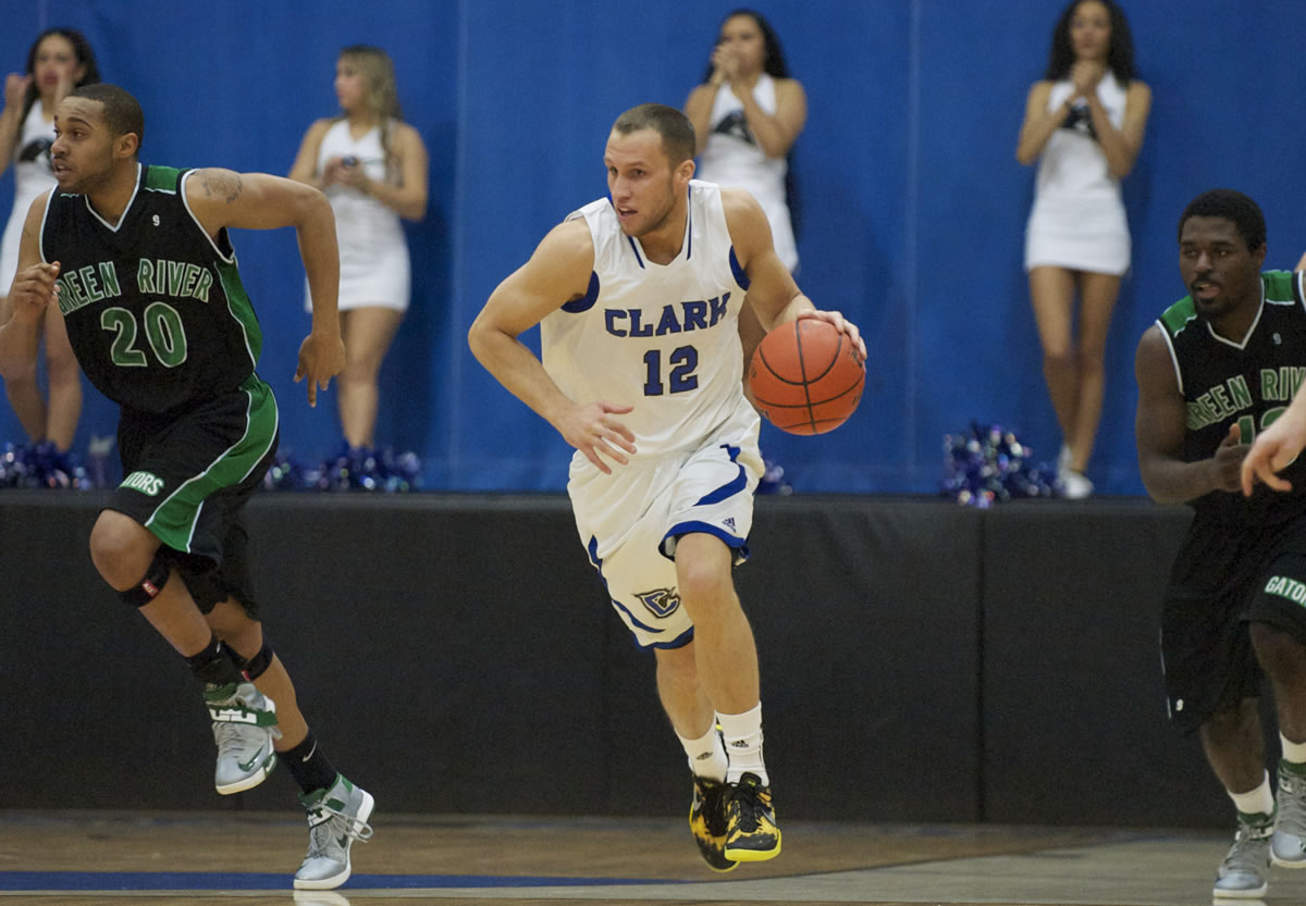 At 25 years old, Clark College's Sean Price, center, has returned to basketball after enduring injuries that kept him out of the game for nearly seven years.