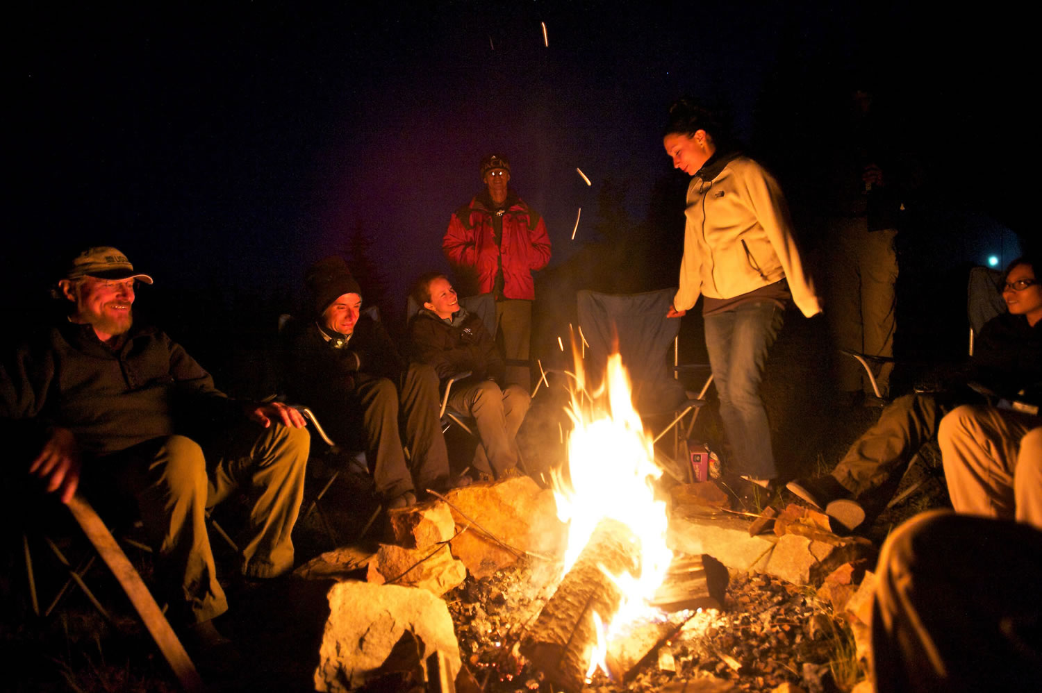 Sitting around a campfire, geologists from several countries swap tales about mysterious creatures at the Mount St.