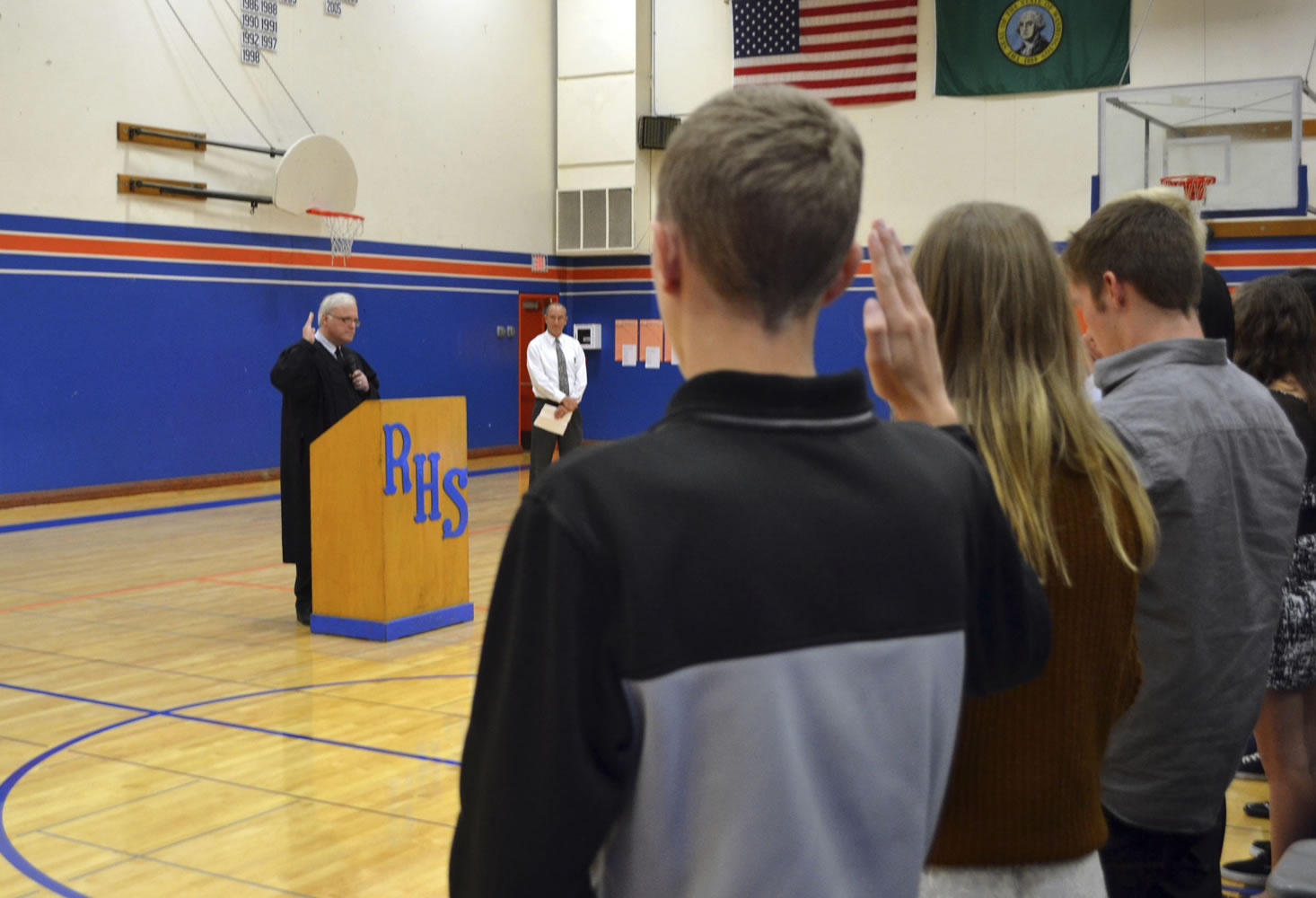 History students simulate a U.S. naturalization ceremony at Ridgefield High School.