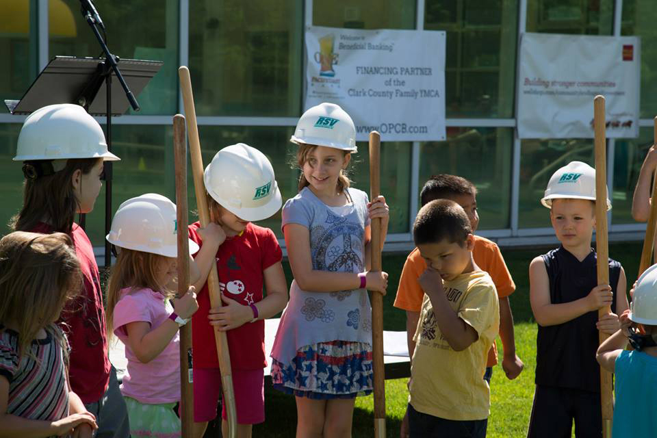 Orchards: Children hold ceremonial shovels at the Clark County Family YMCA in Orchards during its June 22 groundbreaking celebration.