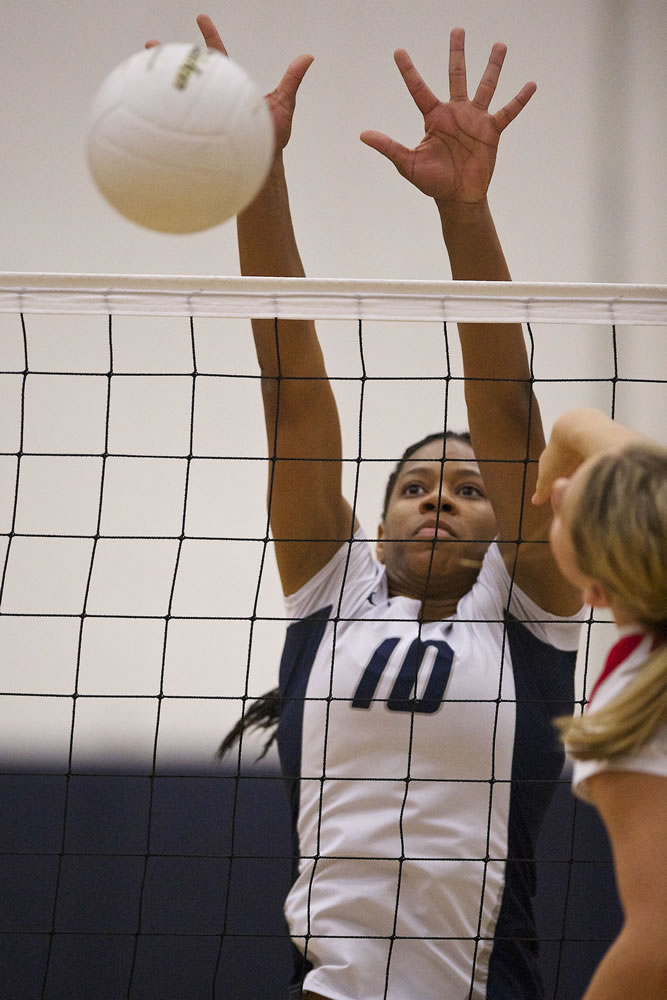 Jocelyn Adams (10) of Skyview High School blocks a spike to score a point in a volleyball game against Camas on Tuesday.