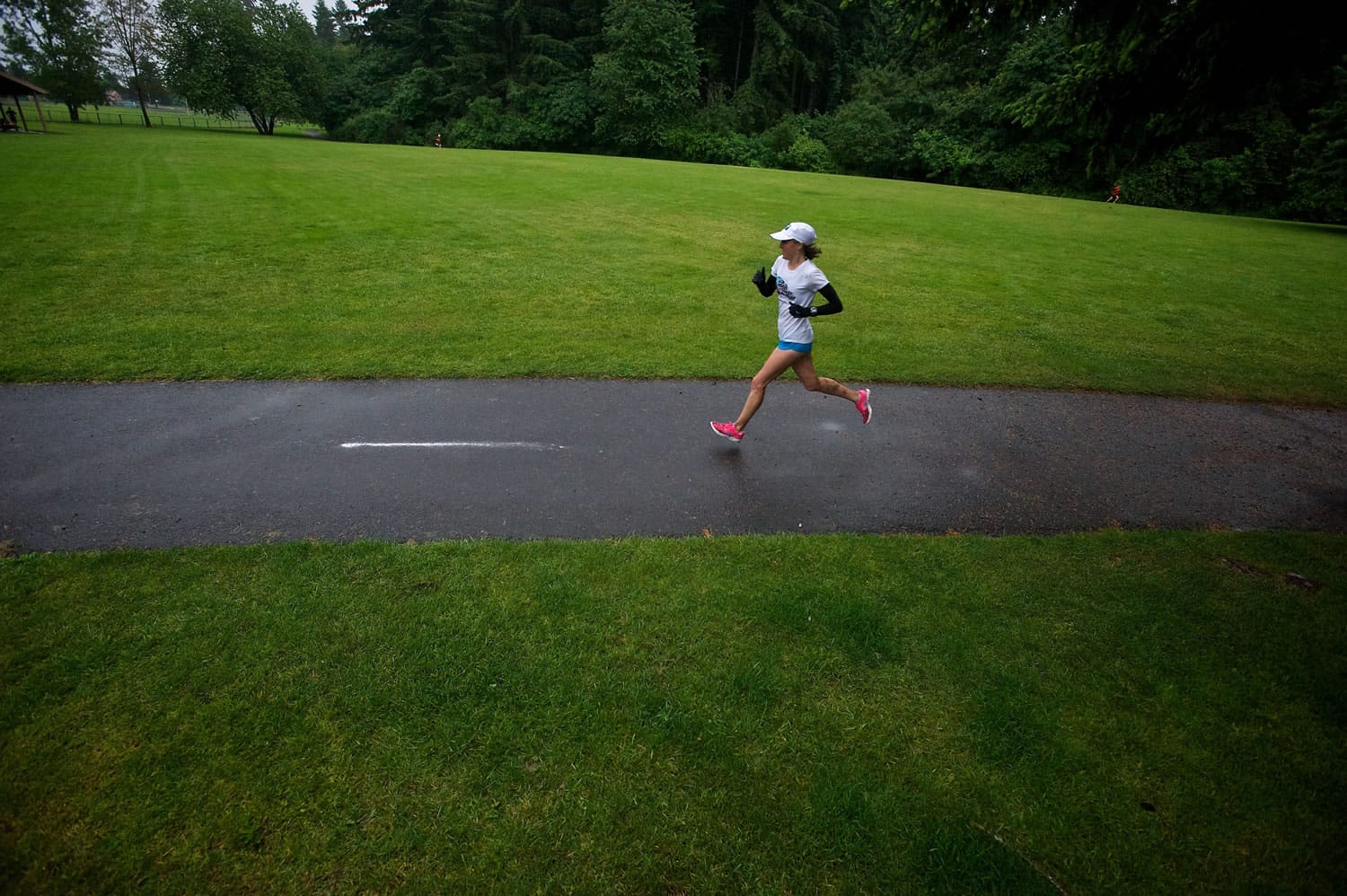 Katarina Mueller, 21, of Vancouver, approaches the finish of the David Douglas 5K Cross Country Run at David Douglas Park.
