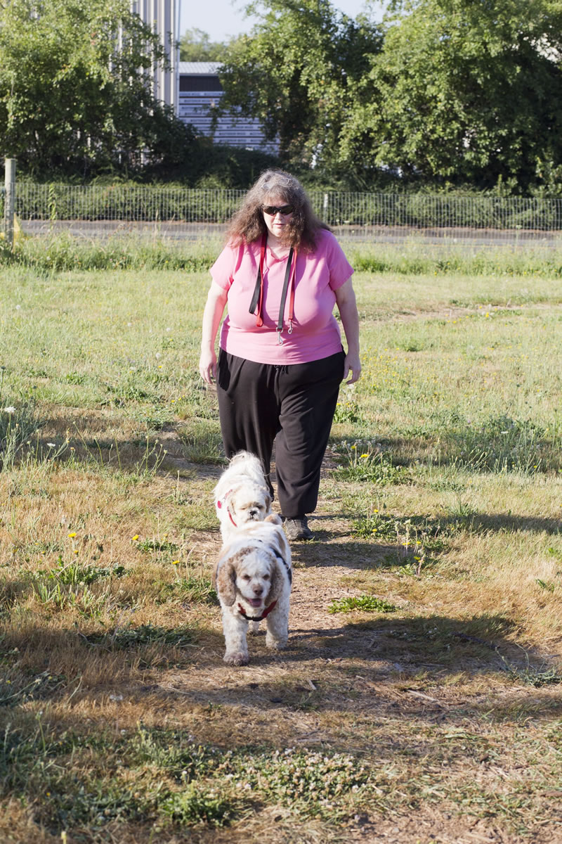 Just as she does most mornings, Bonnie Turnbow walks her dogs Zoe and Beijing at the Stevenson Off-Leash Dog Area in Washougal.