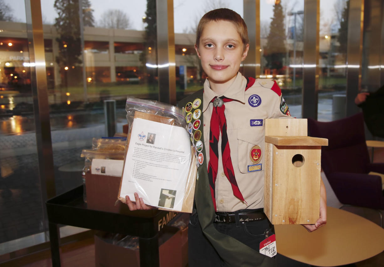 Fourteen-year-old Miles Cottrell of Camas assembled birdhouse kits for students at the school at Randall Children&#039;s Hospital at Legacy Emanuel. Last week, Miles and his family delivered the kits to the teachers at the Portland hospital.