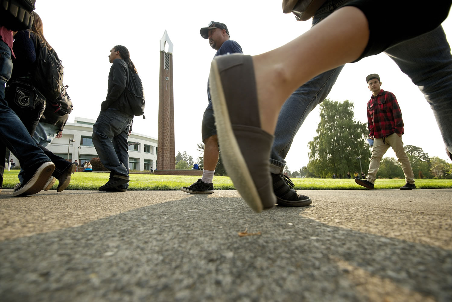 With the chime tower in the background, students head for their classrooms Monday on the first day of the 2012-2013 academic year at Clark College.