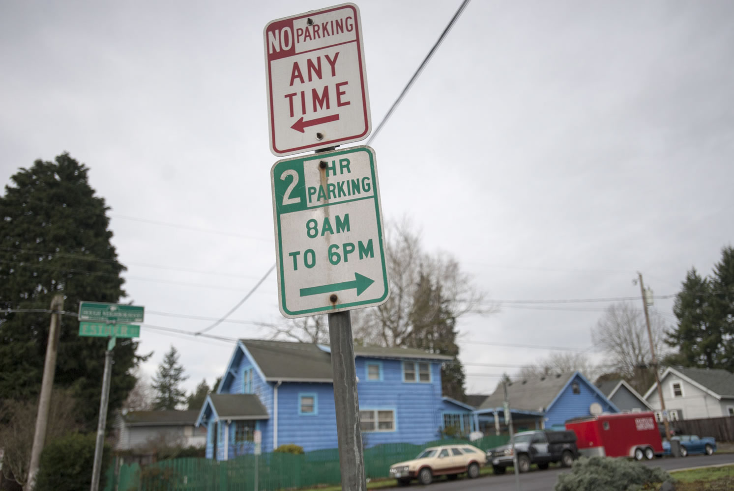Signs indicating that two-hour parking is available are posted in Vancouver&#039;s Hough neighborhood. Residents say they are having issues with parking because nonresidents park in the neighborhood.