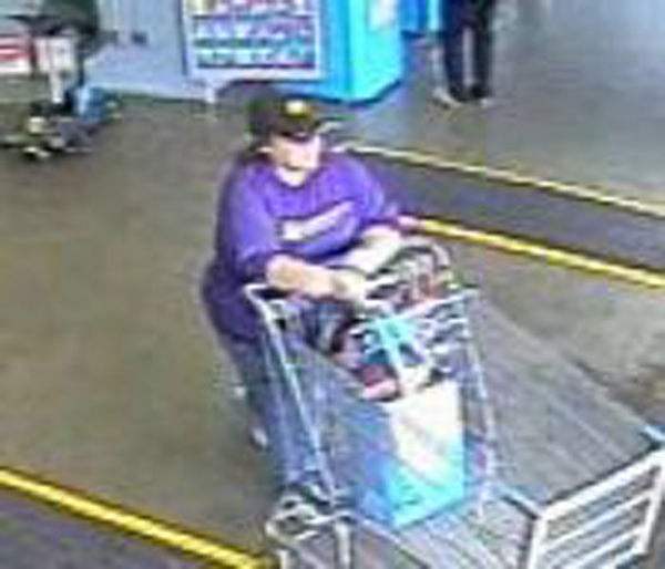 Surveillance video captured this woman snatching a purse April 2 from the Walmart off Mill Plain.