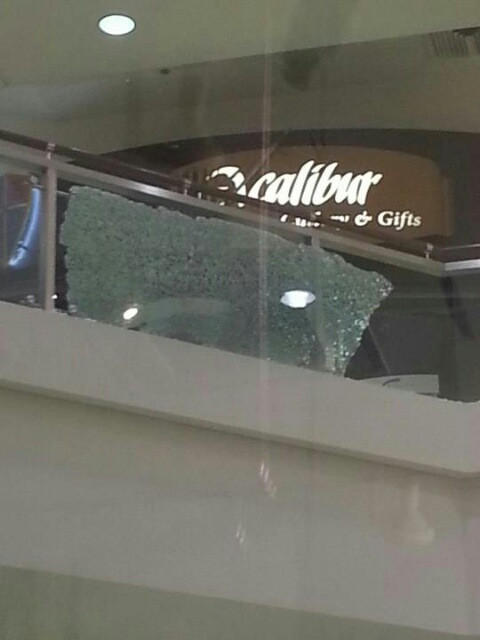 Tweeted by @KATUNews: A picture from a Twitter user of shattered glass inside mall.