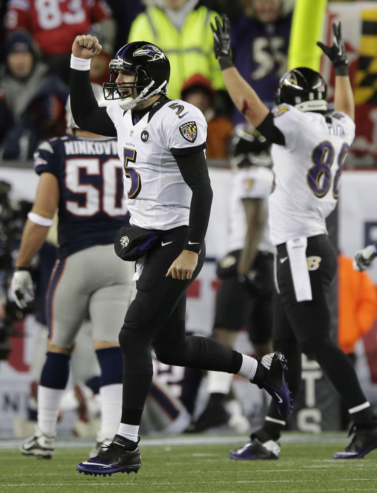 Baltimore Ravens quarterback Joe Flacco celebrates reacts following a touchdown pass to Anquan Boldin in the fourth quarter Sunday.