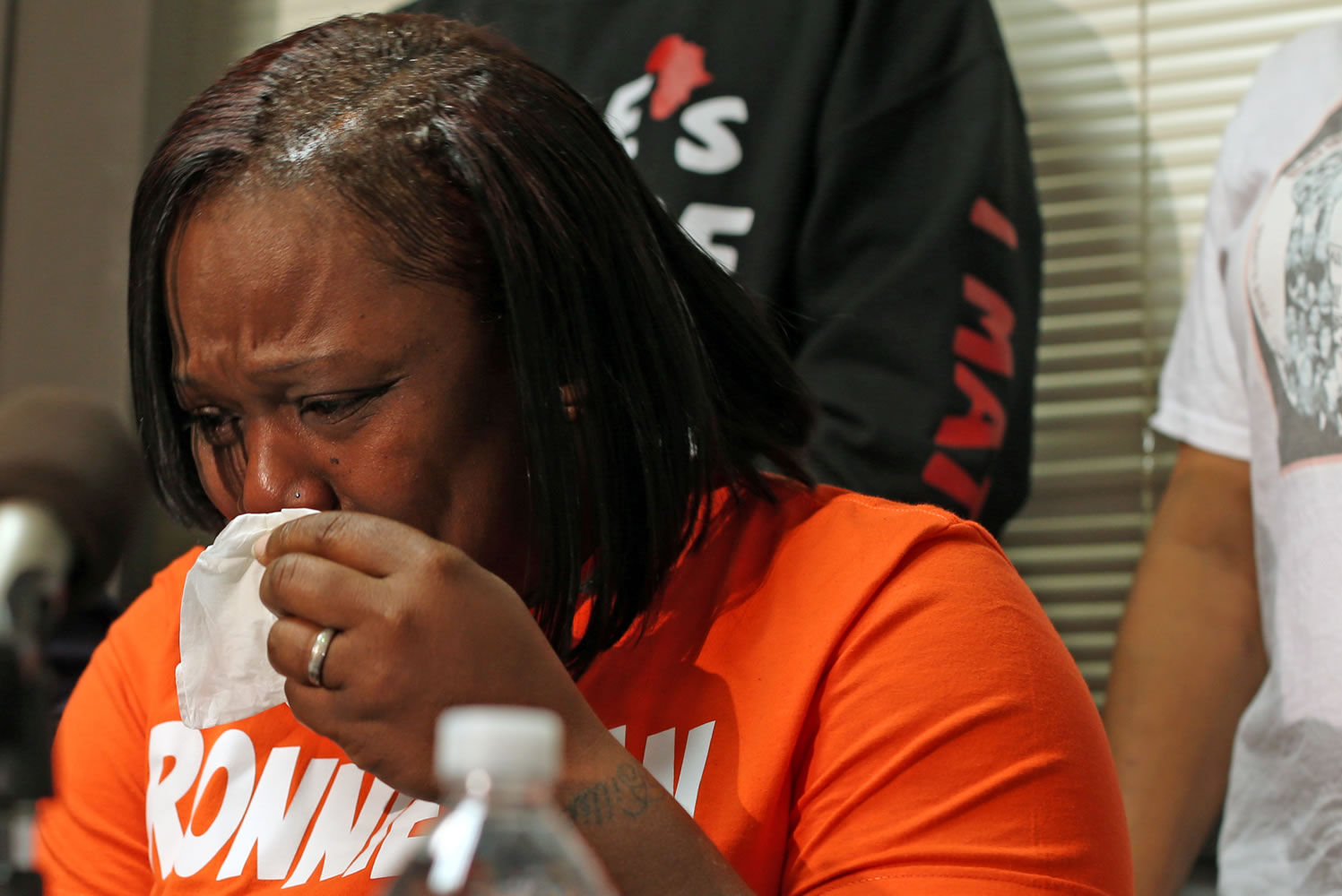 An emotional Dorothy Holmes, the mother of 25-year-old Ronald Johnson, speaks at a news conference Tuesday in Chicago demanding that the dash-cam video of her son being fatally shot by Chicago police on Oct. 12 be released.