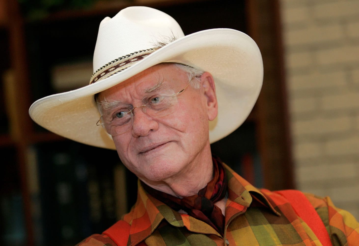 Actor Larry Hagman listens to a reporter's question in 2008 while visiting the Southfork Ranch in Parker, Texas, made famous in the television show &quot;Dallas.&quot; Actor Larry Hagman, who for more than a decade played villainous patriarch JR Ewing in the TV soap Dallas, has died at the age of 81, his family said Saturday.