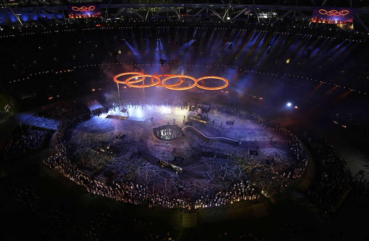The Olympic rings light up the stadium during the Opening Ceremony at the 2012 Summer Olympics, Friday in London.