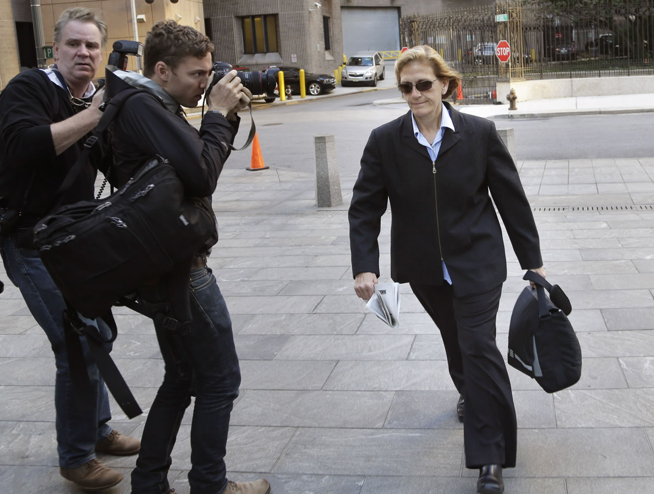 JoAnn Crupi, right, arrives at federal court in New York on Oct. 8.