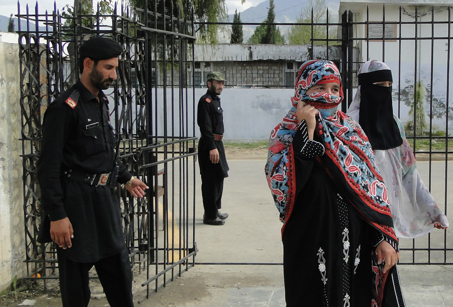 Badam Zari, second from right, leaves the election office after filing her candidacy for Parliament in Khar, capital of the Pakistani tribal area of Bajur, on Monday.