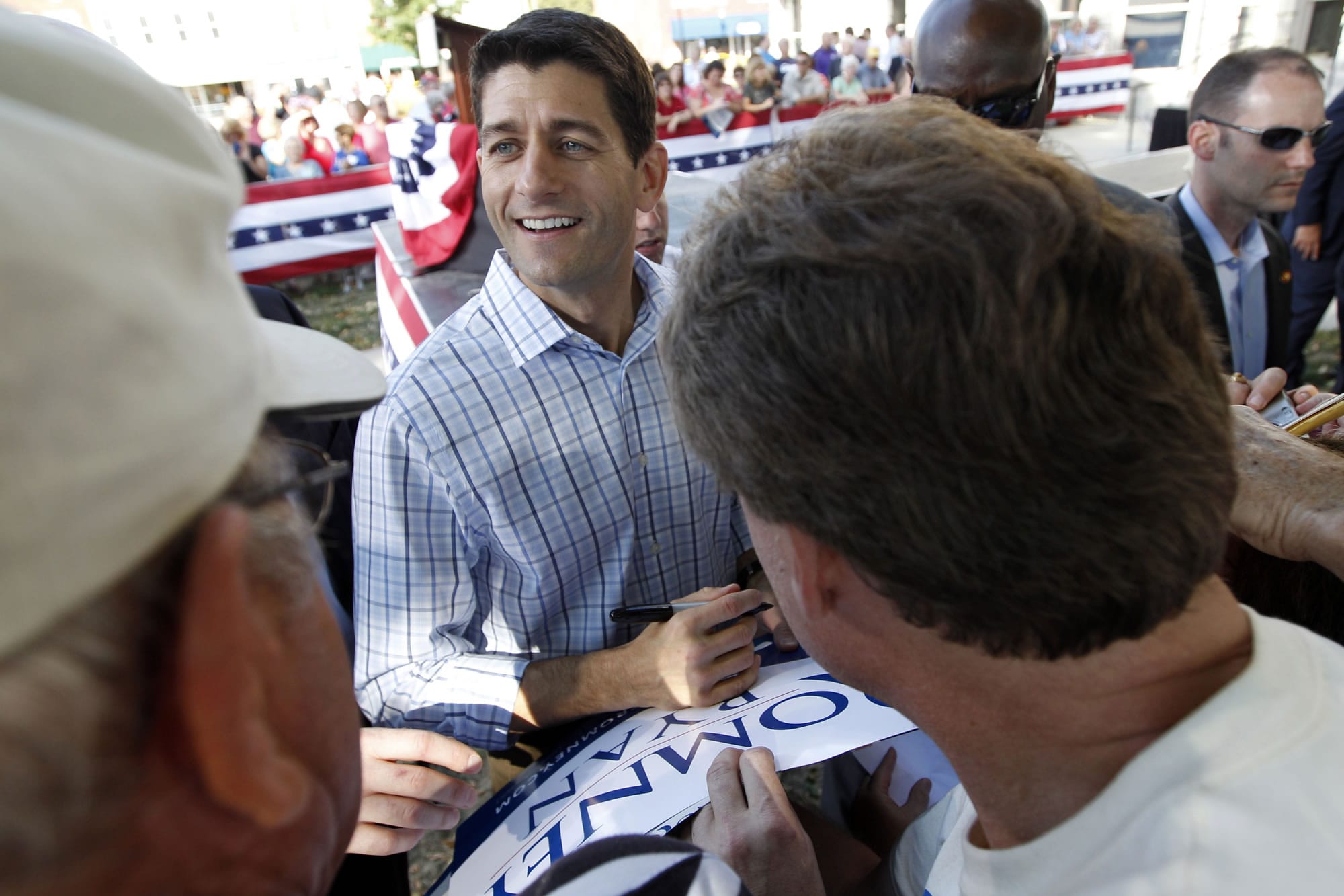 Republican vice presidential candidate, Rep. Paul Ryan, R-Wis. greets supporters during a campaign event on Wednesday in Adel, Iowa.